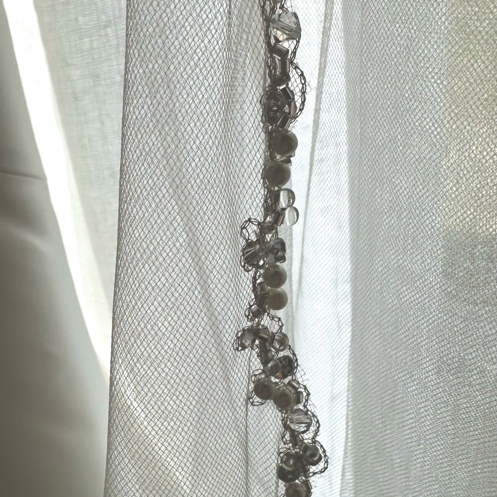 Beautiful beaded vail! Worn once. Cathedral length